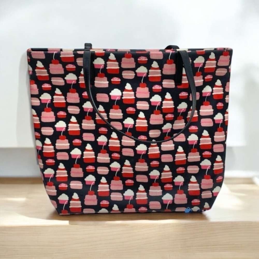 Kate Spade Take the Cake coated canvas open top Bon Shopper Tote w leather trim